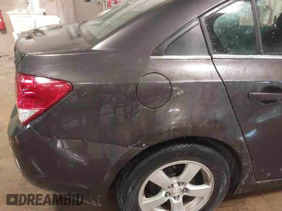 2014 Chevrolet Cruze 1LT with VIN 1G1PC5SBXE7477219, listed as a IAAI auction lot 41970786 with 194,542 mi miles and . Bid and sale history available at DreamBid. Image 13.