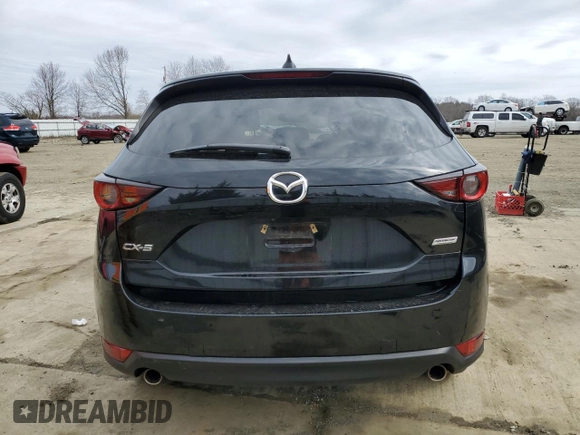 2017 Mazda CX-5 Touring with VIN JM3KFACLXH0195725, listed as a Copart auction lot 47464365 with 65,457 mi miles and Salvage Title. Bid and sale history available at carsss.com. Image 6.