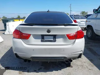 2015 BMW 4 Series 428i xDrive with VIN WBA4C9C54FD330582, listed as a IAAI auction lot 42135691 with 127,289 mi miles and . Bid and sale history available at DreamBid. Image 15.