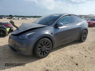 2022 Tesla Model Y Performance with VIN 7SAYGDEF2NF460730, listed as a Copart auction lot 54127945 with 59,735 mi miles and Salvage title. Bid and sale history available at DreamBid. Image 1.