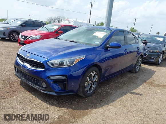 2021 Kia Forte LXS with VIN 3KPF24AD5ME384836, listed as a IAAI auction lot 42098713 with 29,107 mi miles and . Bid and sale history available at DreamBid. Image 2.