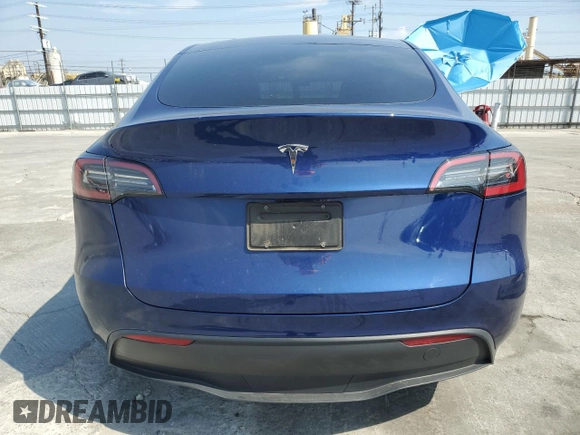 2024 Tesla Model Y with VIN 7SAYGDED0RF102479, listed as a Copart auction lot 55431975 with 23,989 mi miles and Salvage title. Bid and sale history available at DreamBid. Image 6.