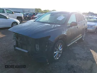 2018 Mazda CX-9 Grand Touring with VIN JM3TCBDY3J0231936, listed as a IAAI auction lot 42159391 with 105,125 mi miles and . Bid and sale history available at DreamBid. Image 2.