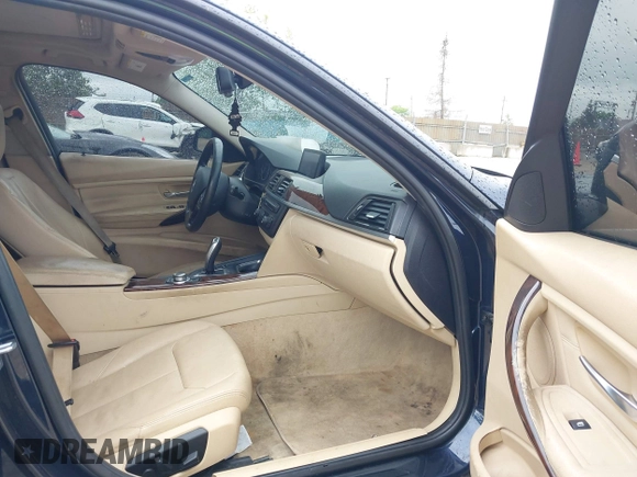 2013 BMW 3 Series 328i xDrive with VIN WBA3B3C50DJ698249, listed as a IAAI auction lot 42303923 with 130,527 mi miles and . Bid and sale history available at DreamBid. Image 5.