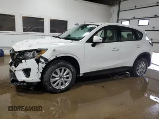 2015 Mazda CX-5 Sport with VIN JM3KE4BY4F0551679, listed as a Copart auction lot 68471374 with 198,987 mi miles and Non Repairable. Bid and sale history available at carsss.com. Image 1.