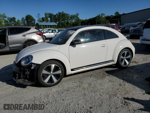 2012 Volkswagen Beetle 2.0T Turbo w/Sun/Snd/Nav PZEV with VIN 3VWVA7AT7CM631038, listed as a Copart auction lot 50749973 with 75,581 mi miles and Salvage Title. Bid and sale history available at carsss.com. Image 1.