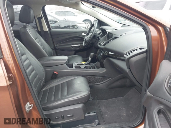 2017 Ford Escape Titanium with VIN 1FMCU0JD3HUB20846, listed as a IAAI auction lot 42182260 with 28,610 mi miles and . Bid and sale history available at DreamBid. Image 5.