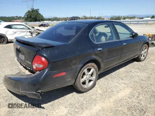 2000 Nissan Maxima GXE z VIN JN1CA31D6YT762114, wystawiony jako Copart lot #57908775 z przebiegiem 207 805 mil mil oraz Szkody całkowita. Historia ofert i sprzedaży dostępna na DreamBid. Obrazek 3.