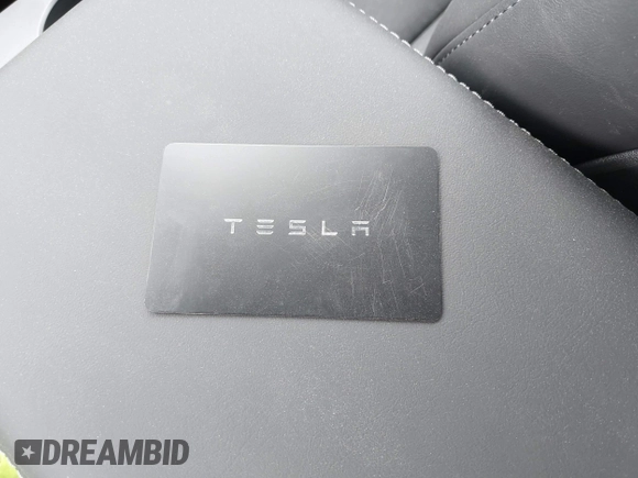 2025 Tesla Model Y Long Range with VIN 7SAYGDEDXSA349480, listed as a IAAI auction lot 41492740 with 1,486 mi miles and . Bid and sale history available at DreamBid. Image 11.