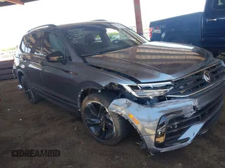 2024 Volkswagen Tiguan SE R-Line Black with VIN 3VVCB7AX4RM046261, listed as a IAAI auction lot 42327569 with 15,428 mi miles and . Bid and sale history available at DreamBid. Image 1.