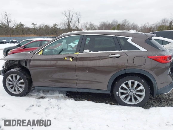 2019 Infiniti QX50 Luxe with VIN 3PCAJ5M30KF129797, listed as a IAAI auction lot 41479436 with 45,902 mi miles and . Bid and sale history available at DreamBid. Image 14.