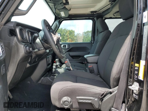 2023 Jeep Gladiator Sport S with VIN 1C6HJTAG9PL525183, listed as a Copart auction lot 54556735 with 13,805 mi miles and Salvage title. Bid and sale history available at DreamBid. Image 7.