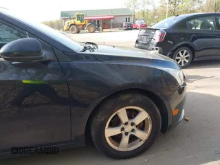 2014 Chevrolet Cruze 1LT with VIN 1G1PC5SB1E7302745, listed as a IAAI auction lot 42142048 with 160,000 mi miles and . Bid and sale history available at DreamBid. Image 17.