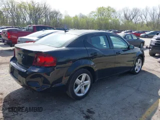 2013 Dodge Avenger SE with VIN 1C3CDZAB7DN519145, listed as a IAAI auction lot 41987503 with 122,121 mi miles and . Bid and sale history available at DreamBid. Image 4.