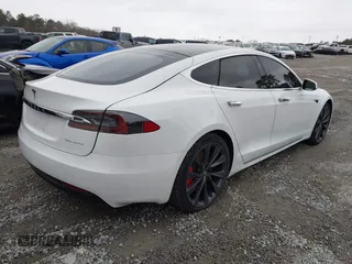 2020 Tesla Model S Long Range with VIN 5YJSA1E27LF370700, listed as a IAAI auction lot 41703463 with 26,024 mi miles and . Bid and sale history available at carsss.com. Image 4.