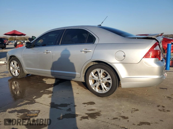 2012 Ford Fusion SE with VIN 3FAHP0HA4CR426943, listed as a Copart auction lot 87314074 with 119,782 mi miles and Salvage Title. Bid and sale history available at carsss.com. Image 2.