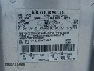 2005 Ford F-150 XL with VIN 1FTRF12225NC03167, listed as a Copart auction lot 61046445 with 153,050 mi miles and Salvage title. Bid and sale history available at DreamBid. Image 12.