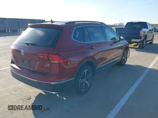 2018 Volkswagen Tiguan SEL z VIN 3VV2B7AX6JM039344, wystawiony jako IAAI lot #41934536 z przebiegiem 93 838 mil mil oraz . Historia ofert i sprzedaży dostępna na DreamBid. Obrazek 4.