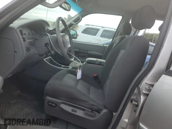 2003 Ford Explorer Sport Trac XLS with VIN 1FMZU67E33UA26245, listed as a Copart auction lot 47224405 with 113,009 mi miles and Salvage title. Bid and sale history available at DreamBid. Image 7.