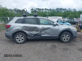2015 Mazda CX-9 Touring z VIN JM3TB2CA1F0455916, wystawiony jako IAAI lot #42226924 z przebiegiem 157 643 mil mil oraz . Historia ofert i sprzedaży dostępna na DreamBid. Obrazek 13.