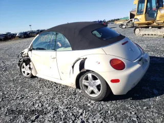 2005 Volkswagen Beetle with VIN 3VWCM21Y15M311018, listed as a Copart auction lot 77611914 with 187,498 mi miles and Salvage Title. Bid and sale history available at DreamBid. Image 2.