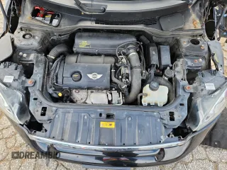 2014 MINI Countryman S with VIN WMWZC3C56EWP25479, listed as a Copart auction lot 61197525 with 101,146 mi miles and Salvage title. Bid and sale history available at DreamBid. Image 11.