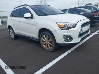 2015 Mitsubishi Outlander SE with VIN 4A4AP4AU0FE050619, listed as a IAAI auction lot 42177118 with 197,098 mi miles and . Bid and sale history available at DreamBid. Image 1.