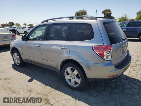 2009 Subaru Forester X with VIN JF2SH63659H717062, listed as a Copart auction lot 58565965 with 197,051 mi miles and Clean title. Bid and sale history available at DreamBid. Image 2.