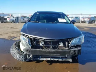 2014 Toyota Camry Hybrid LE with VIN 4T1BD1FK8EU135234, listed as a IAAI auction lot 41399246 with 104,964 mi miles. Bid and sale history available at carsss.com. Image 13.