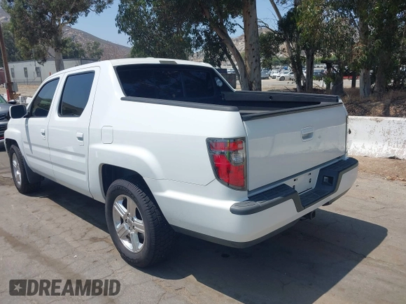 2012 Honda Ridgeline RTL z VIN 5FPYK1F57CB455267, wystawiony jako IAAI lot #42462296 z przebiegiem 186 451 mil mil oraz . Historia ofert i sprzedaży dostępna na DreamBid. Obrazek 3.
