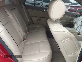 2011 Cadillac STS RWD with VIN 1G6DW6ED4B0128004, listed as a IAAI auction lot 41664631 with 546,850 mi miles and . Bid and sale history available at carsss.com. Image 8.