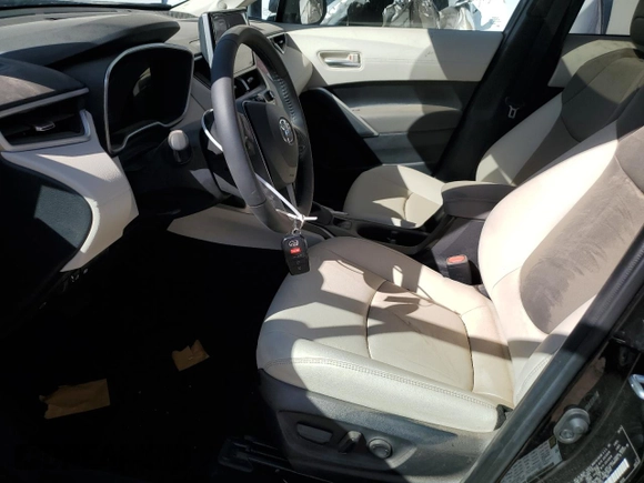 2024 Toyota Corolla Cross XLE with VIN 7MUDAABG2RV107422, listed as a Copart auction lot 47667095 with 8,579 mi miles and Salvage title. Bid and sale history available at DreamBid. Image 7.