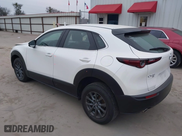2022 Mazda CX-30 S with VIN 3MVDMBALXNM422418, listed as a IAAI auction lot 41531552 with 21,909 mi miles and . Bid and sale history available at carsss.com. Image 3.