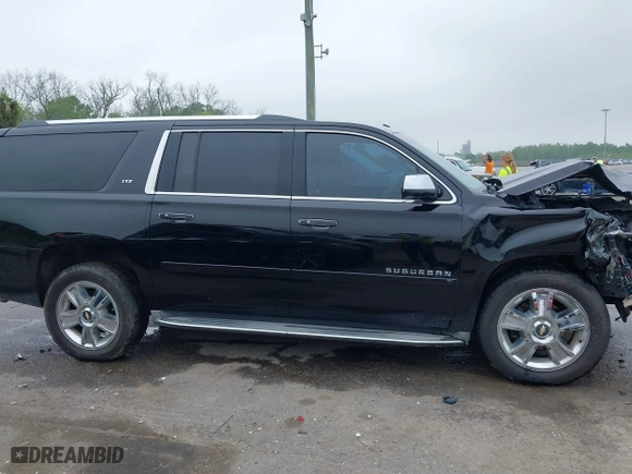 2015 Chevrolet Suburban LTZ with VIN 1GNSCKKC6FR271675, listed as a IAAI auction lot 41915036 with 150,917 mi miles. Bid and sale history available at carsss.com. Image 13.