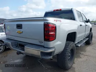 2014 Chevrolet Silverado 1500 LT with VIN 3GCUKREC3EG456385, listed as a IAAI auction lot 41931312 with 62,616 mi miles and . Bid and sale history available at DreamBid. Image 4.