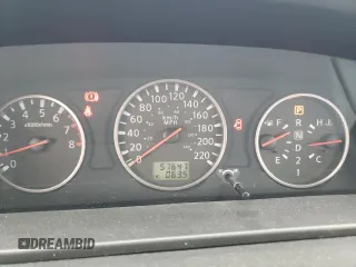 2006 Nissan X-Trail XE z VIN JN8BT08V66W208927, wystawiony jako Copart lot #72816124 z przebiegiem 57 647 mil mil oraz Tytuł czysty. Historia ofert i sprzedaży dostępna na DreamBid. Obrazek 9.