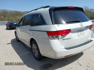 2014 Honda Odyssey EX with VIN 5FNRL5H47EB016885, listed as a IAAI auction lot 42136365 with 100,189 mi miles and . Bid and sale history available at carsss.com. Image 3.