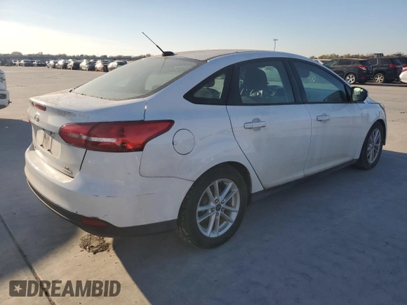 2015 Ford Focus SE с VIN 1FADP3F21FL263604, выставлен на аукционе Copart как лот 82762124 с пробегом 97 298 миль миль и Чистый • Clean title. История ставок и продаж доступна на DreamBid. Изображение 3.