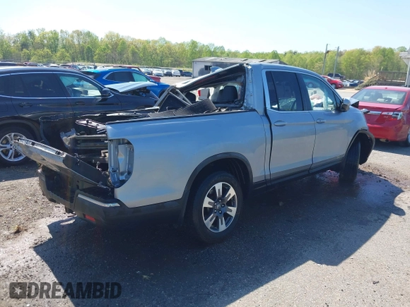 2017 Honda Ridgeline RTL with VIN 5FPYK3F53HB007790, listed as a IAAI auction lot 42060848 with 84,494 mi miles and . Bid and sale history available at DreamBid. Image 4.