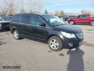 2011 Volkswagen Routan SE with VIN 2V4RW3DG1BR718170, listed as a IAAI auction lot 41847801 with 138,957 mi miles. Bid and sale history available at carsss.com. Image 1.