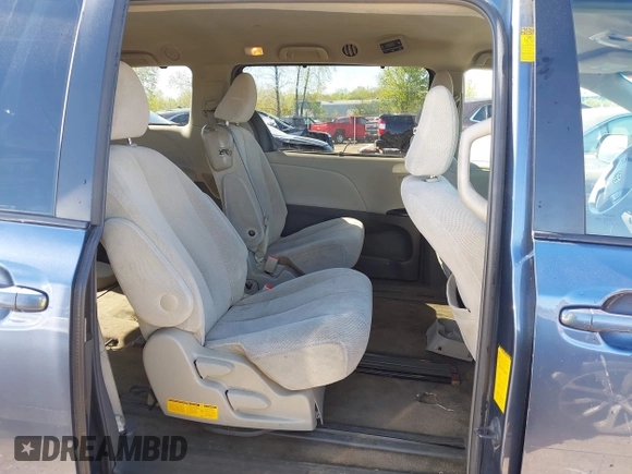 2014 Toyota Sienna LE AAS with VIN 5TDKK3DC4ES464647, listed as a IAAI auction lot 42132627 with 130,724 mi miles and . Bid and sale history available at DreamBid. Image 8.
