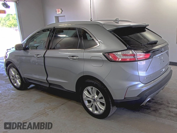 2020 Ford Edge Titanium z VIN 2FMPK4K91LBA91290, wystawiony jako IAAI lot #42494043 z przebiegiem 71 254 mil mil oraz . Historia ofert i sprzedaży dostępna na DreamBid. Obrazek 4.