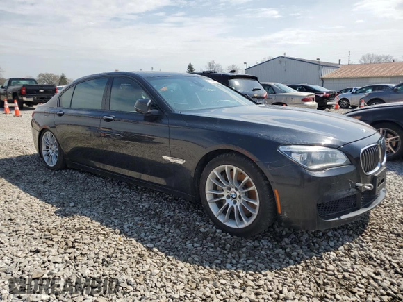 2013 BMW 7 Series 750Li xDrive with VIN WBAYF8C58DD139800, listed as a Copart auction lot 51087605 with 124,436 mi miles and Salvage Title. Bid and sale history available at carsss.com. Image 4.