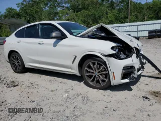 2019 BMW X4 M40i z VIN 5UXUJ5C57KLJ63215, wystawiony jako Copart lot #55150835 z przebiegiem Nie podano mil oraz Szkody całkowita. Historia ofert i sprzedaży dostępna na DreamBid. Obrazek 4.