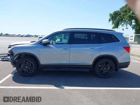 2021 Honda Pilot Special Edition with VIN 5FNYF6H27MB094704, listed as a IAAI auction lot 41953899 with 55,462 mi miles and . Bid and sale history available at DreamBid. Image 15.