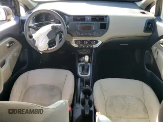 2014 Kia Rio LX with VIN KNADM4A35E6407058, listed as a Copart auction lot 72997044 with 76,215 mi miles and Salvage Title. Bid and sale history available at DreamBid. Image 8.