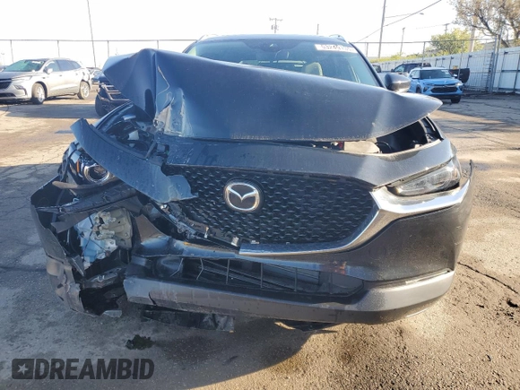 2020 Mazda CX-30 Premium z VIN 3MVDMBEM3LM126527, wystawiony jako Copart lot #53249135 z przebiegiem 42 320 mil mil oraz Szkoda całkowita • Salvage title. Historia ofert i sprzedaży dostępna na DreamBid. Obrazek 5.