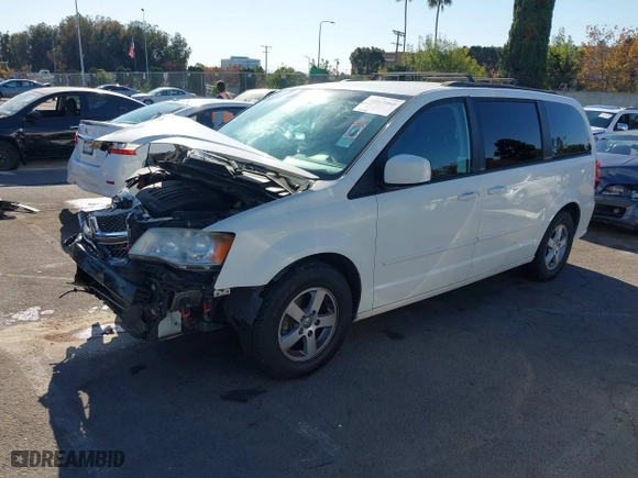 2013 Dodge Grand Caravan SXT with VIN 2C4RDGCG1DR550591, listed as a IAAI auction lot 40915068 with 157,614 mi miles. Bid and sale history available at carsss.com. Image 18.