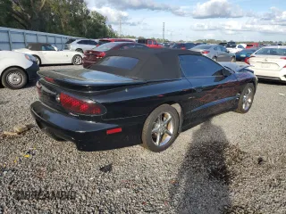 1999 Pontiac Firebird Trans Am with VIN 2G2FV32G1X2217352, listed as a Copart auction lot 79941714 with 174,580 mi miles and Salvage title. Bid and sale history available at DreamBid. Image 3.