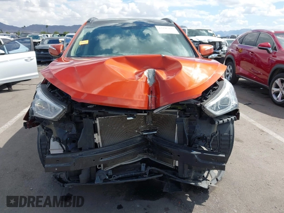 2014 Hyundai Santa Fe z VIN 5XYZUDLB4EG138898, wystawiony jako IAAI lot #42196491 z przebiegiem Nie podano mil oraz . Historia ofert i sprzedaży dostępna na DreamBid. Obrazek 12.